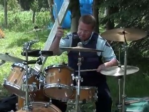 coolest cop ever drumming in woods